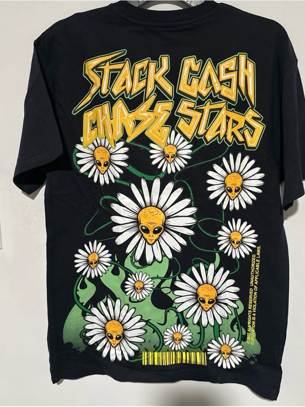 Reason Black Graphic Tee with Yellow and White Daisy-Alien Print